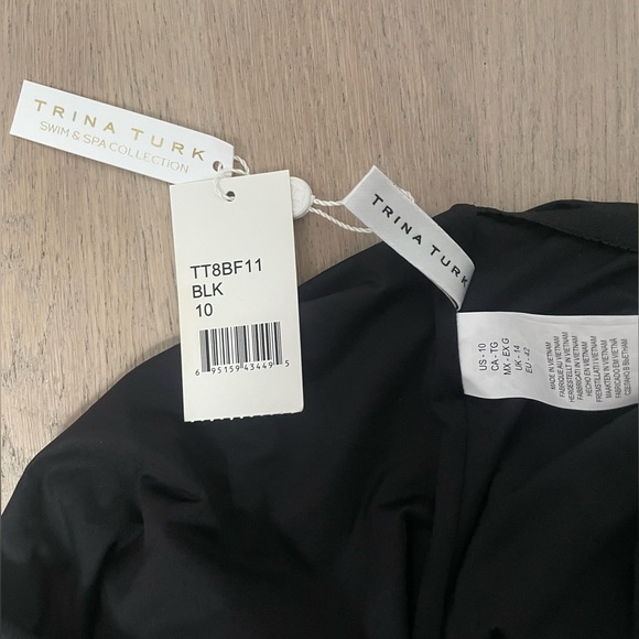 TRINA TURK MONACO SOLIDS OFF THE SHOULDER RUFFLE ONE PIECE BODYSUIT/BATHING SUIT - Picture 4 of 6